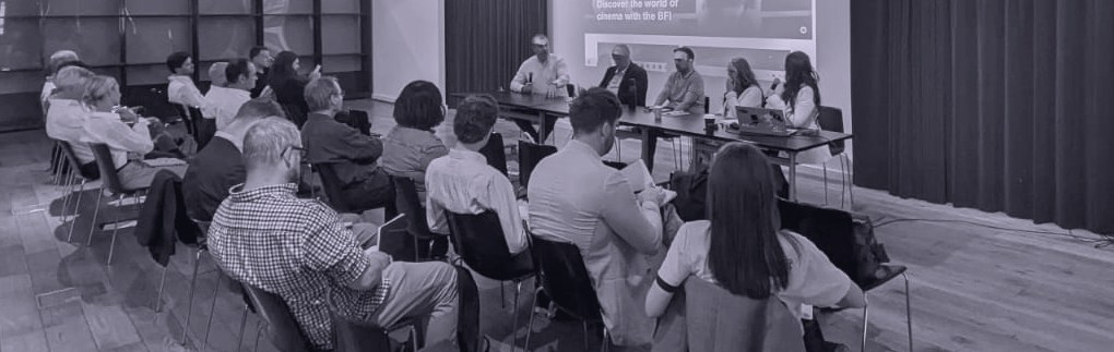 Attendees seated in discussion at a Signal Sessions gathering